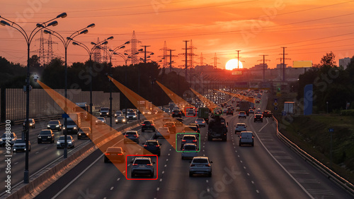Highway Traffic Camera With Artificial Intelligence, Artificial intelligence is built into the traffic control system in a metropolis, Sunset on a busy highway. photo