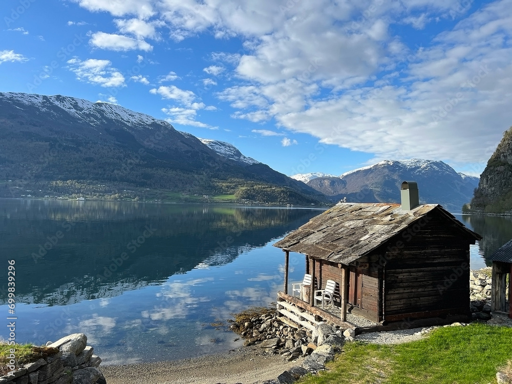 House on the edge of the fjord in Norway