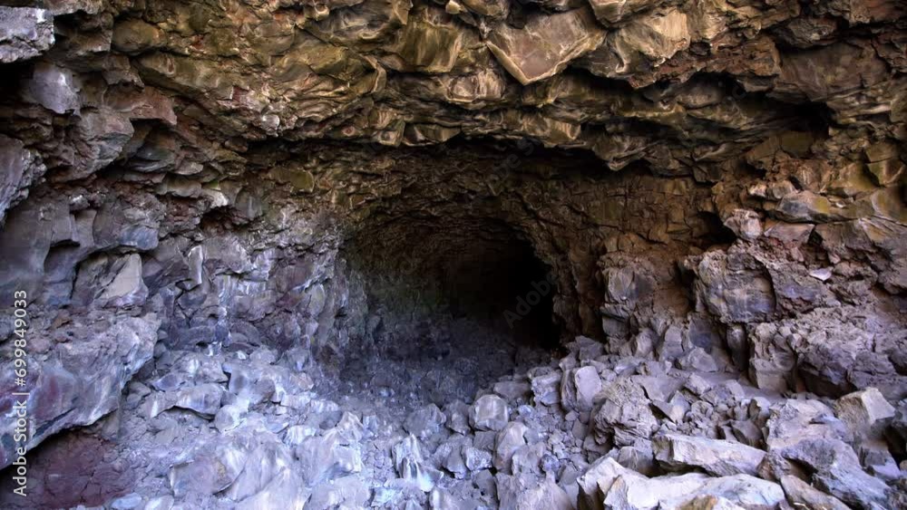 Caving Adventure in Skull Cave Lava Beds National Monument California USA Caving Adventure in Skull Cave Lava Beds National Monument California USA