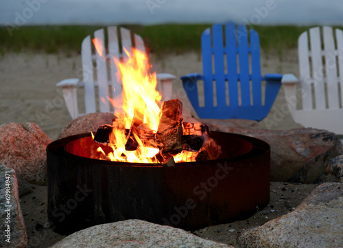 Roaring Fire Pit with Adirondack Chairs on Beach at Chatham, Cape Cod