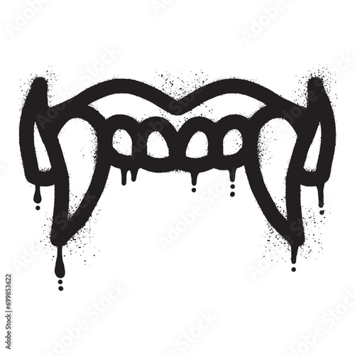 The barong teeth mouth graffiti was drawn with black spray paint	 photo