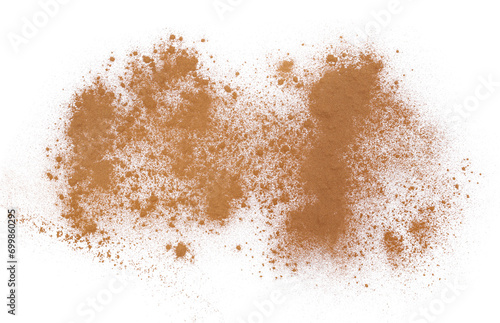 Cinnamon Ceylon ground, pile scattered isolated on white, clipping path