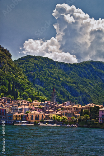 Lake Como town view from a boat in Northern Italy’s Lombardy region at the foothills of the Alps, Europe.