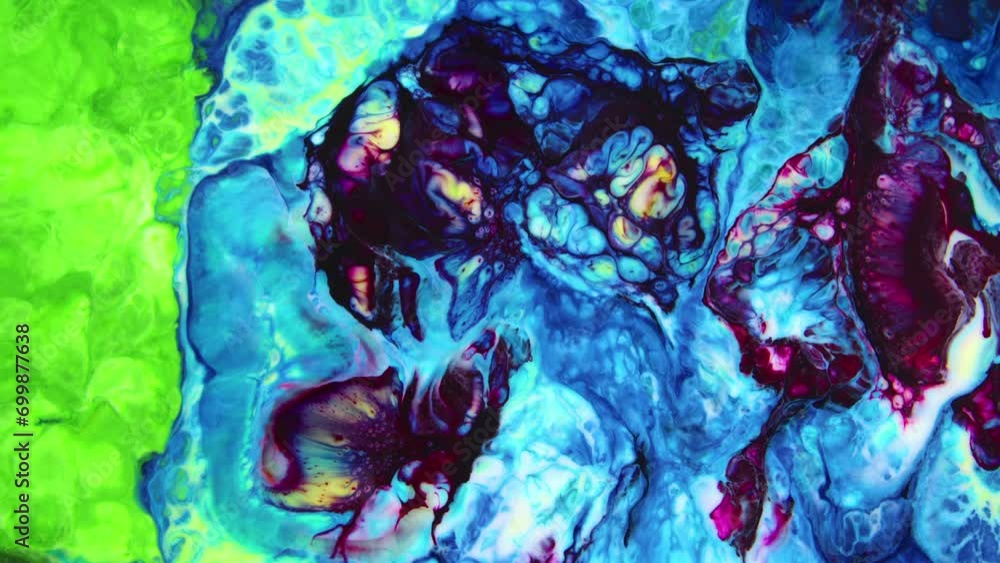 Close-up shot of multi-colored paint mixture boiling in a mixer. They form a unique abstraction that can be used in many video projects, as a background or as a compositing element. Close-up shot of multi-colored paint mixture boiling in a mixer. They form a unique abstraction that can be used in many video projects, as a background or as a compositing element.