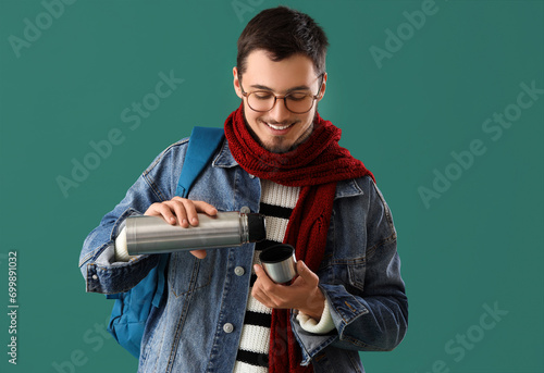 Young man in winter clothes...