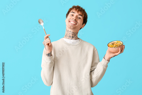 Man holding bowl with cerea...