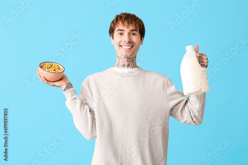 Man holding bowl with cerea...