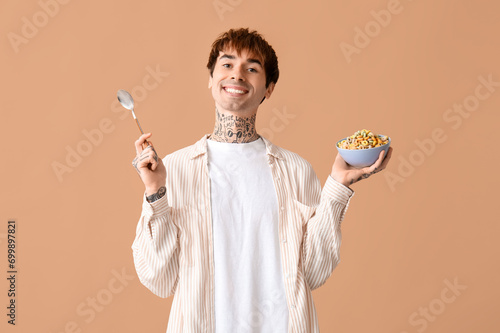 Man holding bowl with cerea...