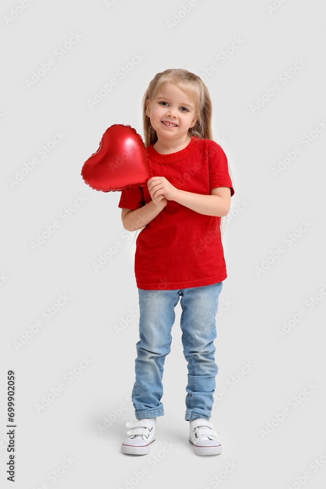 Cute little girl with red heart shaped balloon on white background. Valentines Day celebration Cute little girl with red heart shaped balloon on white background. Valentines Day celebration