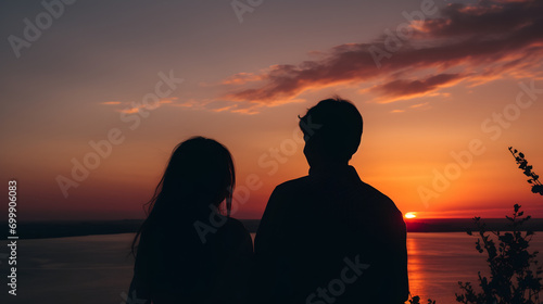 young couple in love on a beautiful sunset on the beach © Jess rodriguez