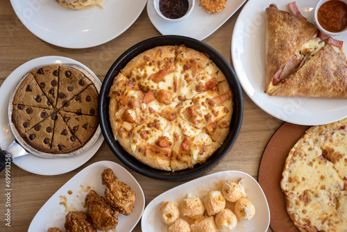 Top view, Pizza and other fast food on wooden table