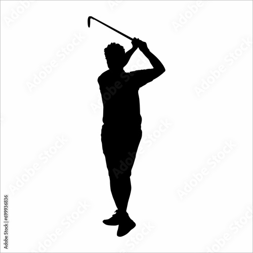 Silhouette of a man playing golf