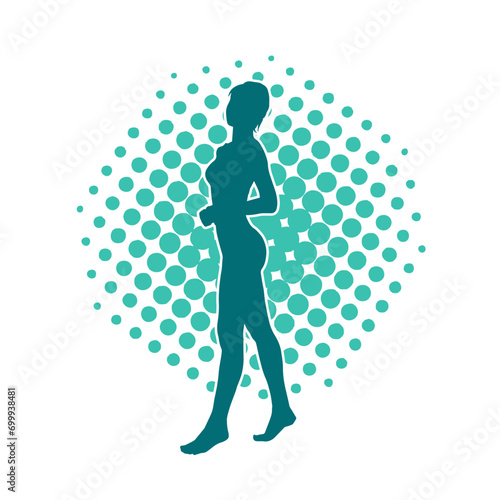 Silhouette of a slim female model wearing casual outfit standing in feminine pose.