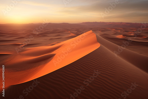 The vast expanse of a desert at dawn