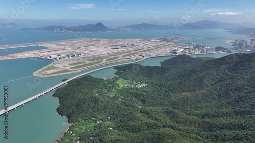 Aerial drone skyview of Boeing Airbus airplane take off and landing at Chek Lap Kok international airport Lantau Island near Tung Chung Tuen Min Hong Kong-Zhuhai-Macao Bridge photo