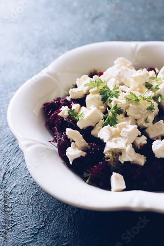 Healthy salad with beet root, feta cheese and parsley