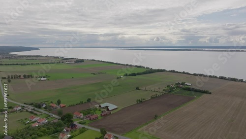 Agricultural Fields And Village Seen From The Medieval Castle Brahehus Near Vattern, Sweden. Aerial Shot photo