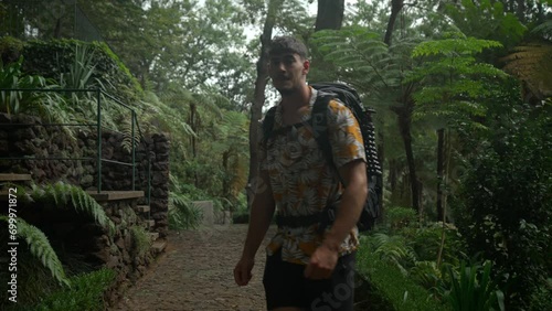 Footage filmed in Madeira Portugal at Monte Palace tropical garden. Filmed at nice daylight with a man model walking, incredible landscapes, jungle, water, forest, tropical palnts, and nature. photo