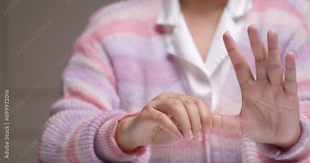 Woman hand has office syndrome and relaxation arthritis with self-massage stretching finger reflexology. Woman hand has office syndrome and relaxation arthritis with self-massage stretching finger reflexology.