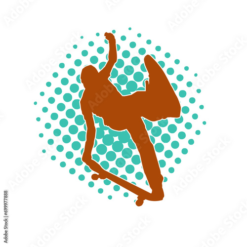 Silhouette of a teenager boy playing skateboard. Silhouette of a male in action pose on skateboard.