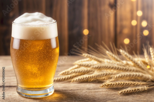 Beer in glass with wheat ears on wooden table with blurred background and copy space. Generative AI.