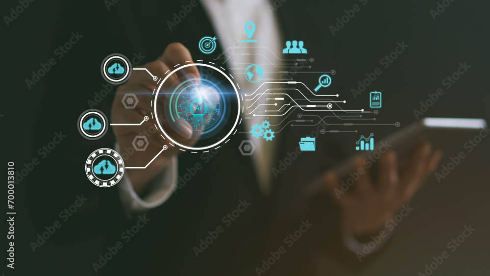 Fototapeta premium Businessman using stylus on hologram. AI analyze and visualize complex information on a virtual screen using AI to process data. Big data technology, Data flow, Artificial intelligence.