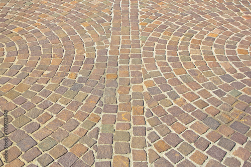 New paving made with porphyry stone blocks of cubic shape in a p photo