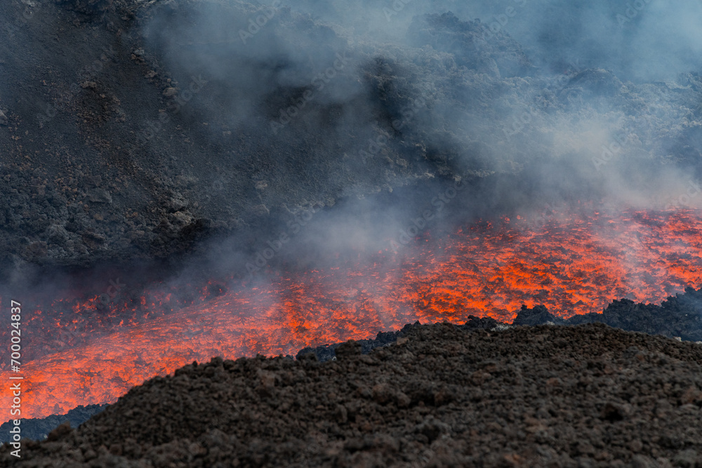 Eruptive vent with lava emis at the top of the Etna volcano