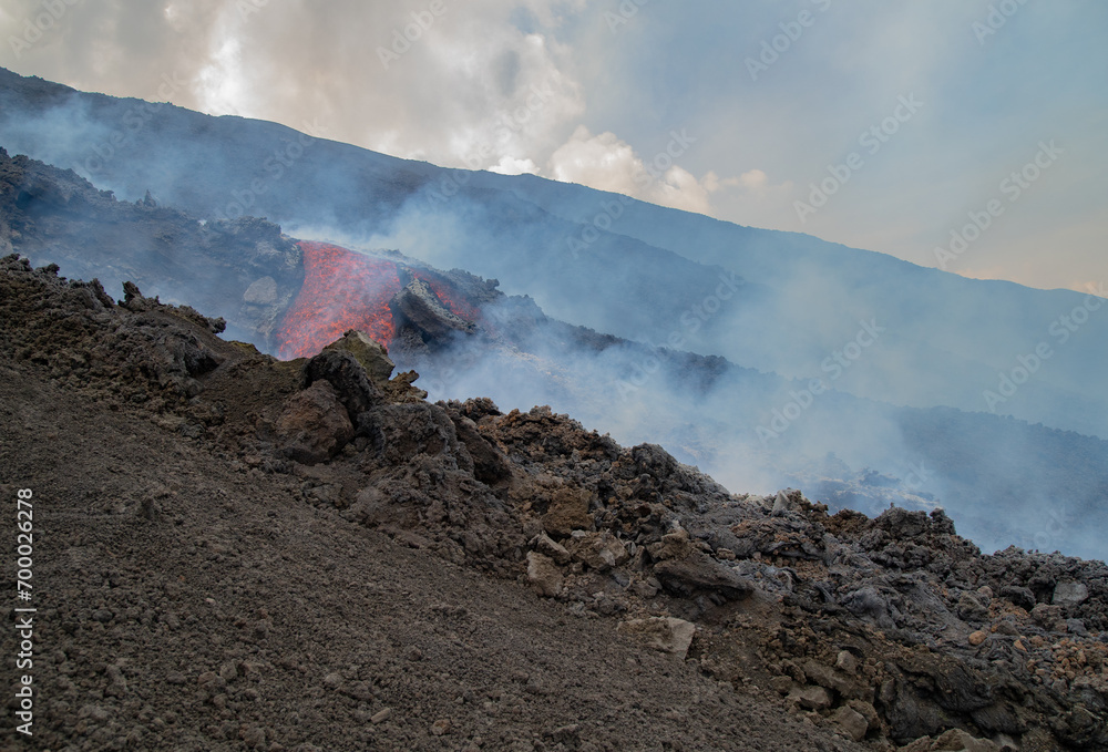 Eruptive vent with lava emis at the top of the Etna volcano
