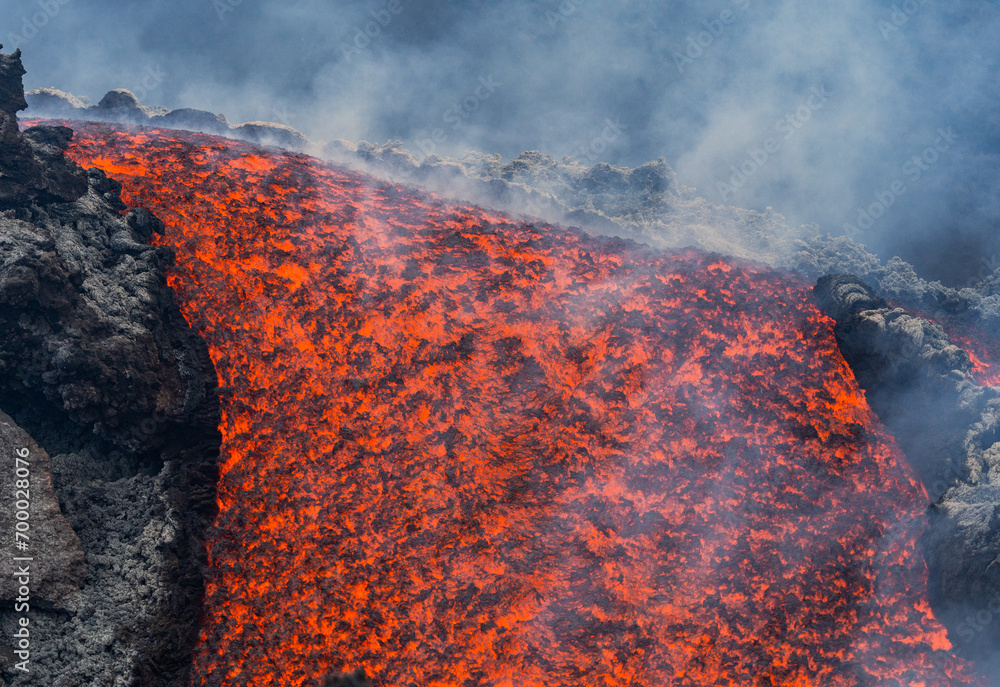Eruptive vent with lava emis at the top of the Etna volcano