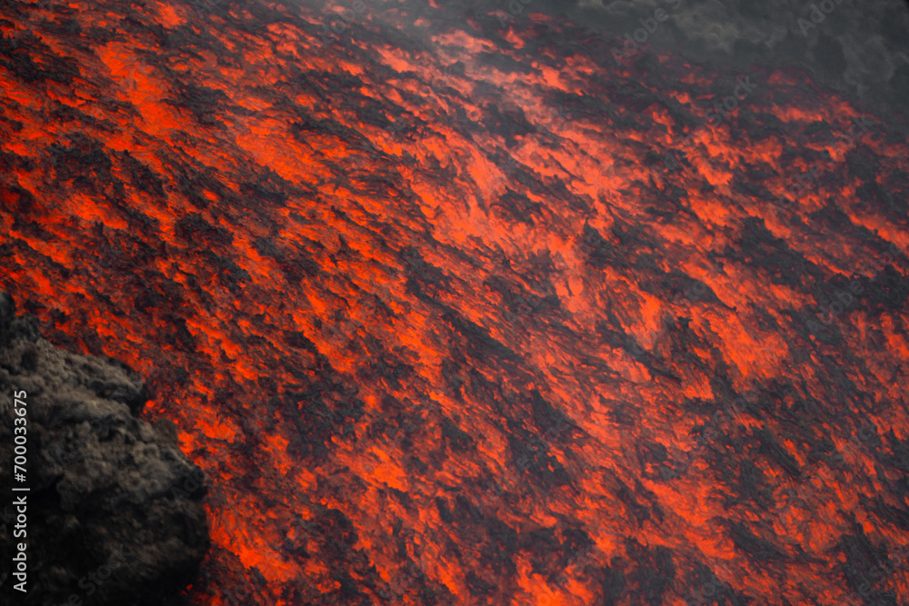 Eruptive vent with lava emis at the top of the Etna volcano