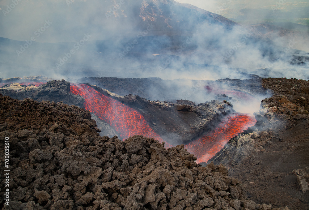 Eruptive vent with lava emis at the top of the Etna volcano