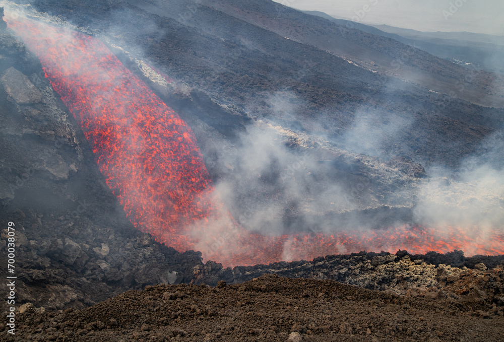 Eruptive vent with lava emis at the top of the Etna volcano