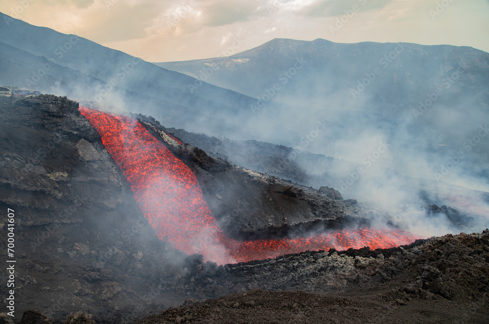 Eruptive vent with lava emis at the top of the Etna volcano