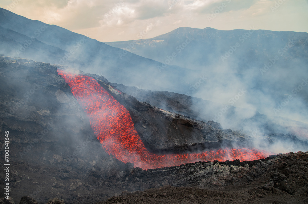 Eruptive vent with lava emis at the top of the Etna volcano