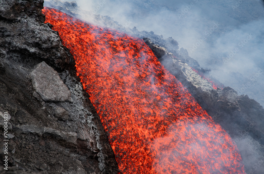 Eruptive vent with lava emis at the top of the Etna volcano