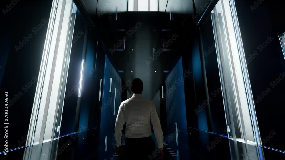 Systeme immunitaire numerique. Man in Futuristic Office Interior Moving and Activating Hologram.