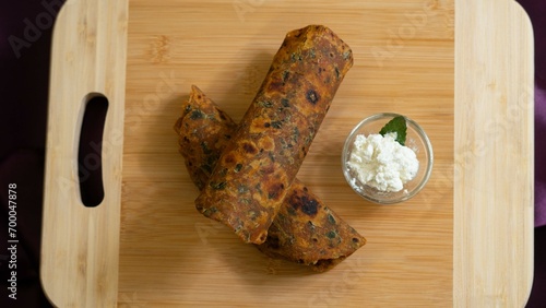 Paratha with curd, Moong Dal or Split Moong Dal Paratha also known as stuffed Moong Dal flatbread dish originating from the Indian subcontinent.