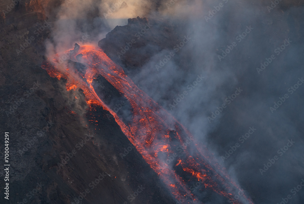 Eruptive vent with lava emis at the top of the Etna volcano