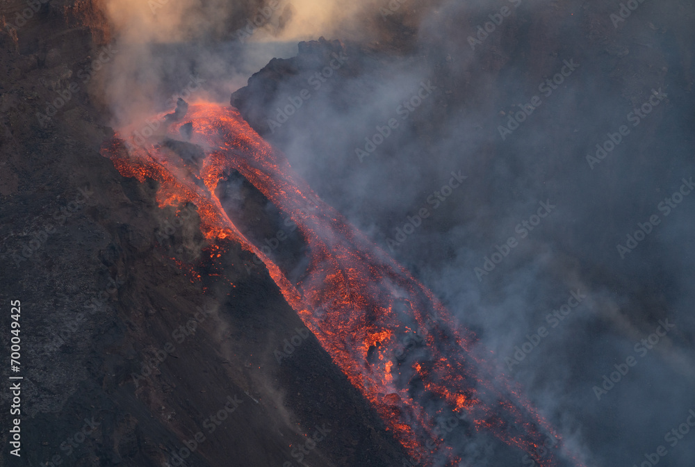 Eruptive vent with lava emis at the top of the Etna volcano