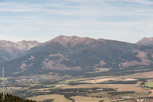 Baranec, Tri kopy, Hruba kopa and Banikov hills in Western Tatras mountains from hiking trail bellow Slema hill in Low Tatras mountains in Slovakia photo