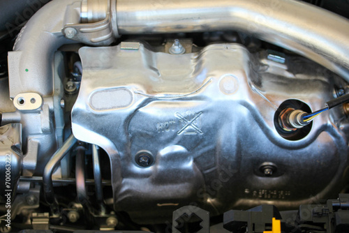 Exhaust heat shield on a new vehicle engine