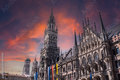 Munich Frauenkirche with town hall in the sunset