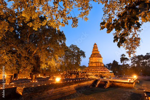 Wiang Kum Kam is Ancient Lost City, the ruined temples at the night, Chiang Mai province in Thailand. The old city was built by King Mangrai around the latter part of the 13th century. photo