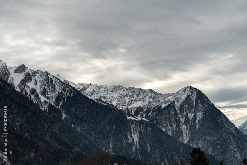 Snow covered alps at the rhine river seen from Triesenberg in Liechtenstein