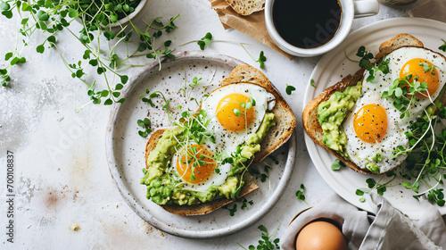 Healthy breakfast with avocado egg sandwiches coffee