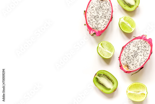 summer pattern with kiwi and pitaya white background top view mock up