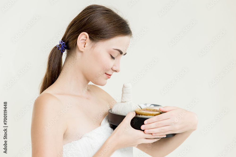 Beauty women caucasian model with herbal spa massage cream set isolated on white background Beauty women caucasian model with herbal spa massage cream set isolated on white background