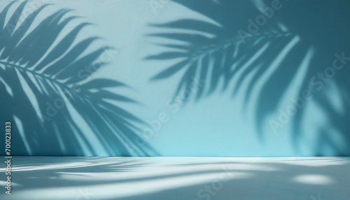 Empty palm shadow blue color texture pattern cement wall background. Used for presentation business nature organic cosmetic products for sale shop online. Summer tropical beach with minimal concept