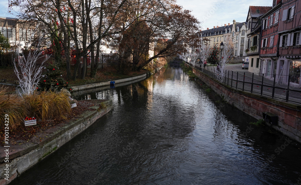 Strasbourg, France - December 18th, 2023 - Photo of the river and decorated streets and buildings in Strasbourg.